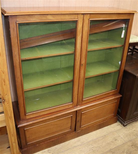 A late Victorian mahogany bookcase, in two parts W.122cm